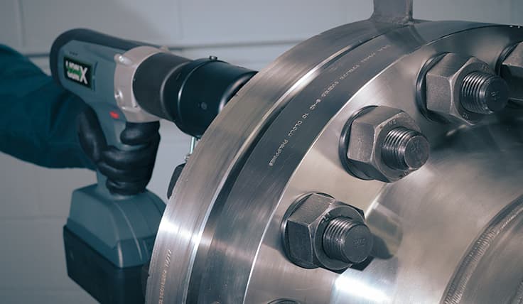 The LION GUN X Electric Torque Tool in use with the full HYTORC Washer System, completely eliminating pinch points on the application